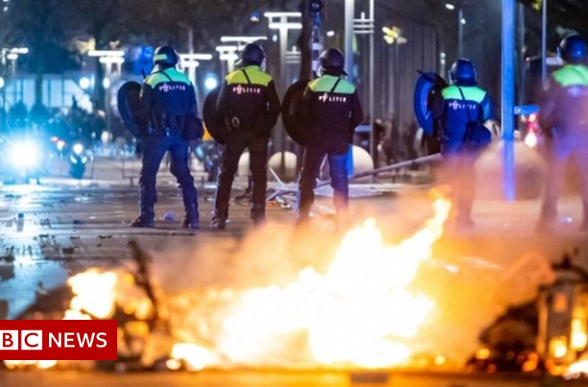  Rotterdam police clash with rioters as Covid protest turns violent – BBC News