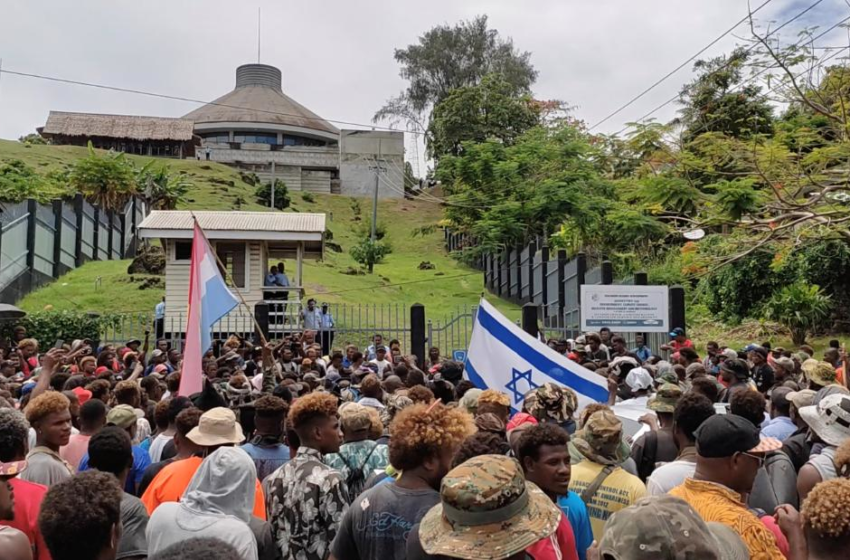  Solomon Islands enters 36-hour lockdown after protests turn violent – CNN