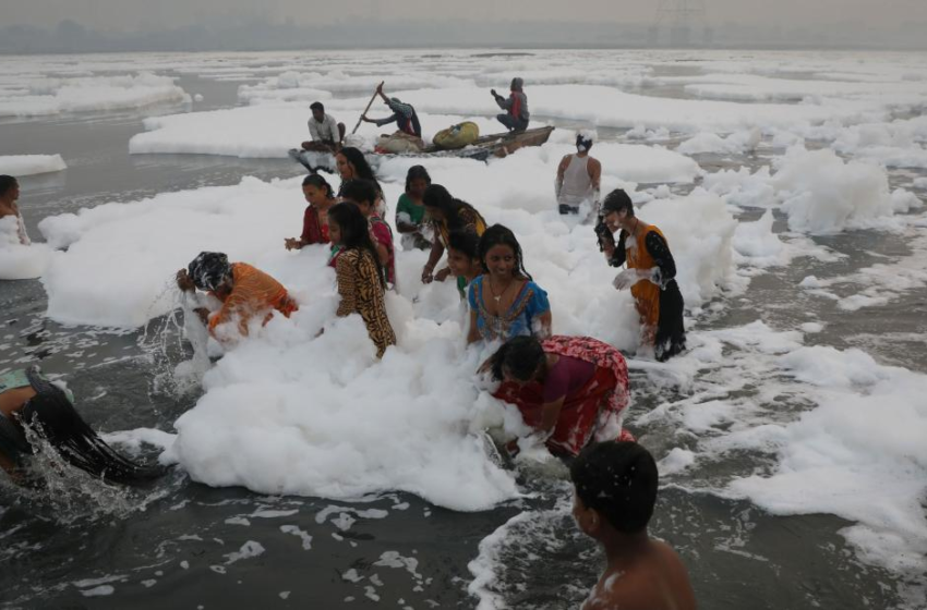  Toxic foam coats sacred river in India as Hindu devotees bathe in its waters – CNN