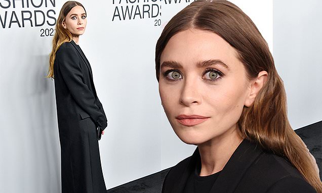  Ashley Olsen wears usual black attire including floor-length coat to CFDA Fashion Awards in NYC – Daily Mail