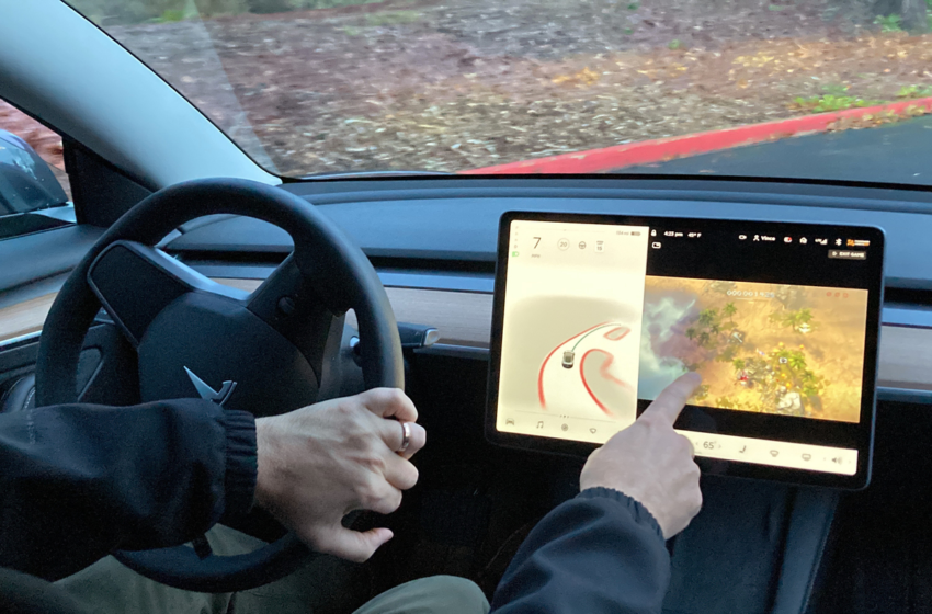  Tesla disables video games on center touch screens in moving cars – NPR