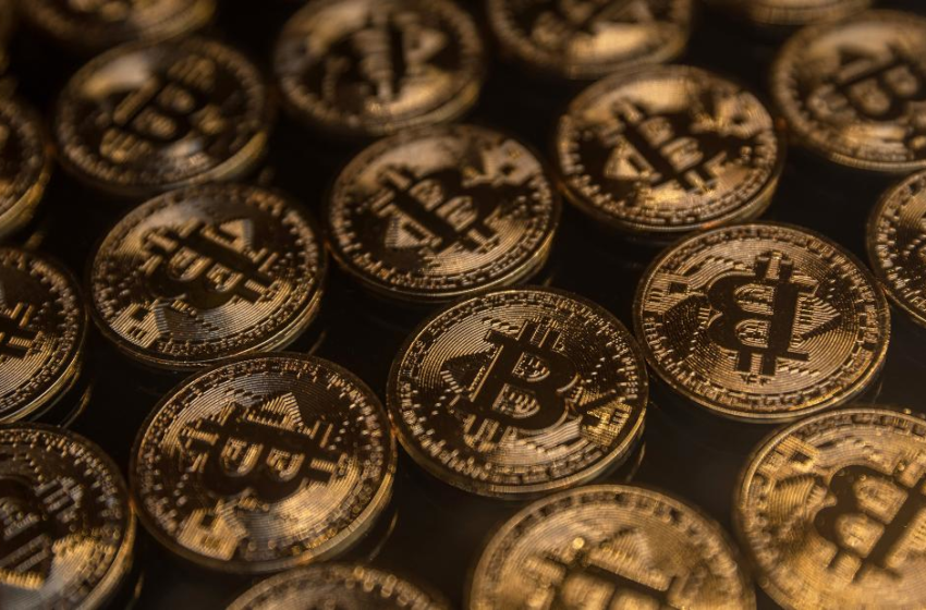  Bitcoin value tumbles almost 50% since record November – CNN