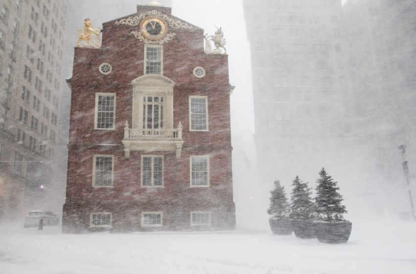  Boston ties snow record as massive storm gives way to bitter cold across East – USA TODAY