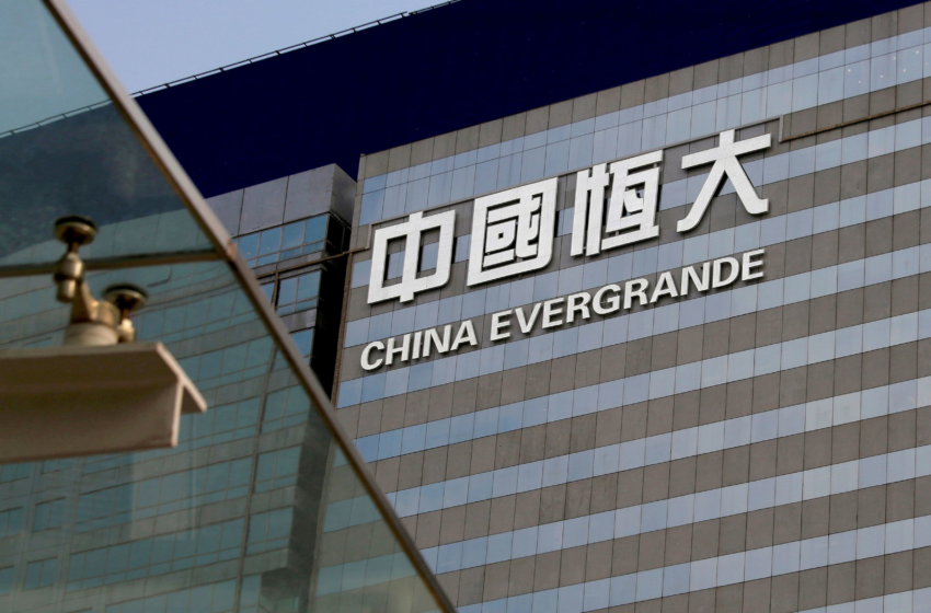  China Evergrande shares reopen higher; developer says contracted sales dropped 38.7% in 2021 – CNBC