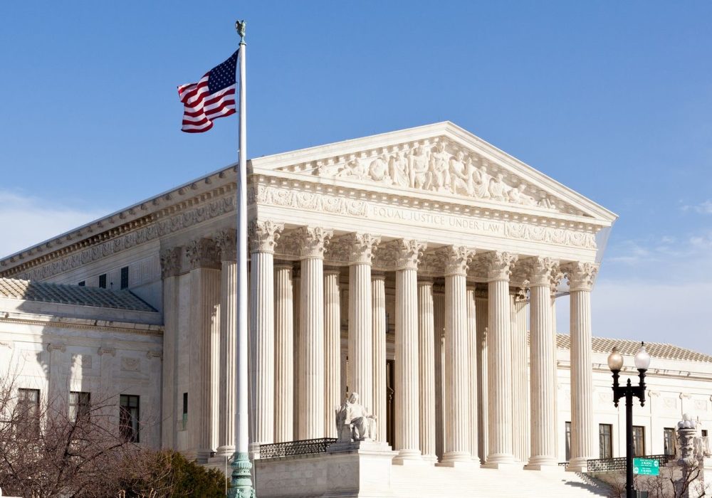 Facade of US Supreme court in Washington DC on sunny day